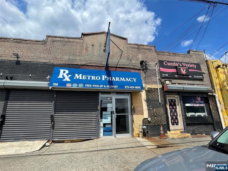 Exceptional commercial opportunity in Newark, ideally located adjacent to the brand new Lions Gate development. This versatile property features three street-level commercial storefronts along high-traffic Frelinghuysen Avenue, offering excellent visibility and consistent foot traffic. In addition, the building includes two warehouse spaces with access from Foster Street, providing flexible options for storage, distribution, or light industrial use. Situated in a prime, rapidly developing area, this property presents tremendous upside potential for investors, owner-users, or redevelopment. A rare chance to acquire a multi-use asset in one of Newarkâ€™s most promising growth corridors.