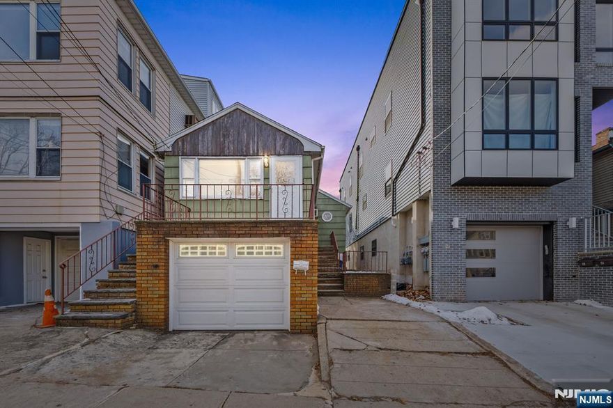A comprehensive virtual tour is available, showcasing video walkthrough, interactive 3D model, and detailed floor plan. https://www.njproper.com/119-carlton. Set on a 25â€™ x 100â€™ lot in a prime Jersey City Heights location, this single-family home with garage and parking offers strong redevelopment and investment potential. An ideal opportunity for developers considering a new two-family build (buyer to verify zoning) or end users seeking a solid home with future upside. The property features forced hot air heating, two kitchens, two bedrooms, two full bathrooms, an existing garage, a side driveway parking space, a deeded street parking spot, and a spacious backyard. Well maintained and in good condition, the home is suitable for immediate occupancy, rental hold, or future development. Conveniently located near Central Avenue shopping, parks, and NYC transportation, this is a rare chance to secure a versatile property in one of Jersey Cityâ€™s most desirable and rapidly appreciating neighborhoods.