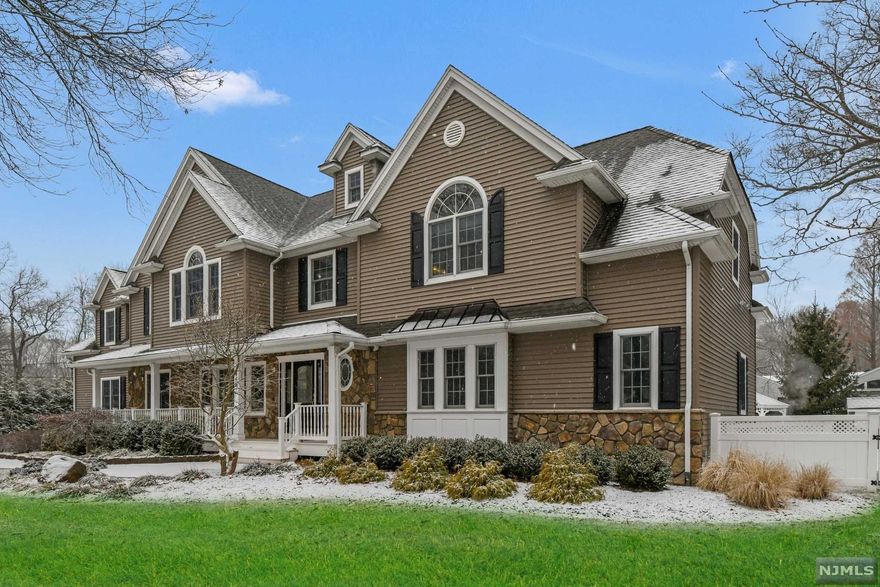 This meticulously maintained home is located on one of the most desirable streets in Wyckoff. The first floor features a en-suite bedroom, large bedroom/office and half bath, the 2nd floor features a laundry room, 3 large Bedrooms, 2 full baths, and a large master bedroom suite w/dual vanities, 2 WIC. The oversized kitchen has a large double island, breakfast nook, built-in Meile coffee/espresso maker, high end appliances and plenty of cabinet space. The home is situated on over 1/2 acre of professionally landscaped property. The backyard and pool area give the home a true resort like feeling, a true entertainer's dream, with a salt water liner pool, cabana with running water, refrigerator, huge Azek deck off of the family room and a large flat yard. In the basement there is a 700 bottle wine cellar, workout area, and small kitchen. High efficiency HVAC and LED lighting throughout, whole house generator, in home A/V system. Walk to Calvin Coolidge School and NYC transportation.