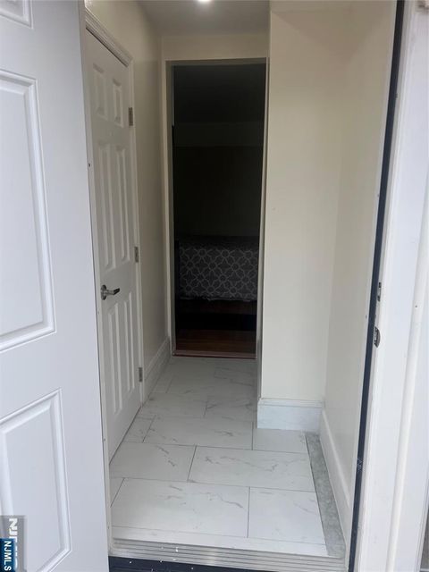 Photo of 285 Highwood St, Teaneck, NJ 07666 (MLS # 26013547)