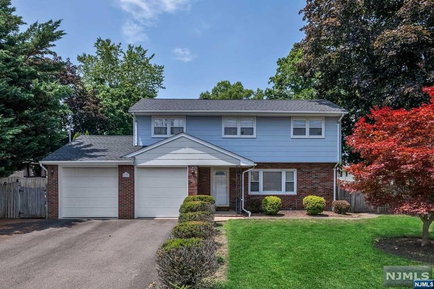 Welcome to Northvale! Upon entering this charming split level home you will be greeted with a spacious entry foyer, den and full bath. Steps up into sunlit living room with wood burning fireplace, dining area into kitchen with open concept and slider out back to deck and above ground pool. Entertainers delight! Three bedrooms and one full bath complete the second floor. The basement has washer/dryer hookups, utlities, storage and bilco doors for outside access. The two car garage is a plus as well! To be in the Northern Valley school districts is a plus and this home is close to all! Don't miss out..it won't last!