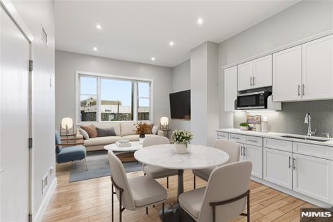 Photo of 12 Dempsey Ave #A, Edgewater, NJ 07020 (MLS # 26022768)