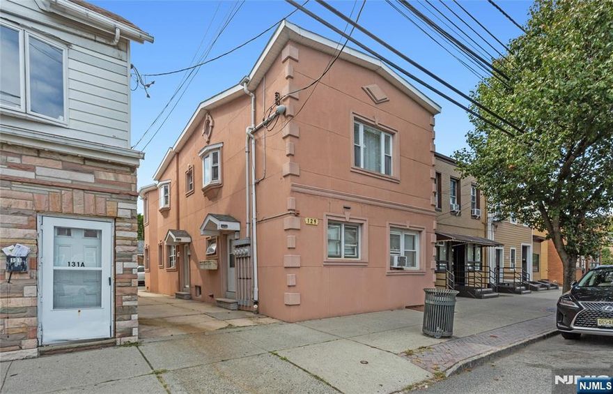 ATTENTION ALL INVESTORS ! Unique renovated 3 family plus BONUS studio in the heart of Hackensack within a mile of the reknown Hackesnack hospital. Unit 1 has 1 bedroom and 1 bath with shower over tub. Hardwood floor. Living Room. Eat-In-Kitchen. Unit 2 has 2 good size bedrooms. Living Room. Eat-In-Kitchen with Granite Countertops and Breakfast Bar. Dining Area. Recessed lights. Harwood floors. Central Air. Washer and Dryer hook ups. Attic with bessler stairs. Bay window. Bathroom with shower over tub. Converted garage is Studio with Living Room, Kitchenette. Bathroom has shower. 2 off street parking spaces. Free overnight street parking. Common Driveway. Ideally located to schools, shopping, dining and NYC transprotation right on Hudson St. A truly fantastic opportunity. Not to be missed !