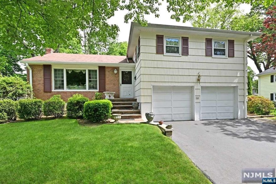 COME SEE THIS EXPANDED SPLIT-LEVEL, LOCATED ON A LOVELY STREET IN THE PRESTIGIOUS LATCHSTRING SECTION OF ORADELL! THE HOME OFFERS CEDAR SHAKE SIDING & BRICK FRONT. TWO CAR GARAGE W/4 CAR DRIVEWAY. TILE ENTRY FOYER, LARGE LIVING RM W/VAULTED CEILING, FORMAL DINING RM W/FRENCH DOORS LEADING TO A 400 SQ.FT. GREAT RM ADDITION W/FPL, VAULTED CEILING & SKYLIGHTS. THE KITCHEN IS WAITING FOR THE NEW OWNER'S PERSONAL TOUCH. HARDWOOD FLOORS THROUGHOUT 1ST & 2ND FLRS. UPSTAIRS HAS A PRIMARY BDRM W/TWO CLOSETS & ENSUITE BTH. TWO ADDITIONAL GOOD SIZED BDRMS & HALL BTH. GROUND LEVEL HAS A 4TH BEDOROOM, OPEN SPACE FOR A SITTING OR WORK FROM HOME AREA, DOOR TO PATIO, 1/2 BATH & GARAGE ACCESS. FINISHED BSMNT W/AMPLE STORAGE SPACE & A FULLY EQUIPPED LAUNDRY RM. ANDERSON WINDOWS ON 1ST FLOOR W/DOUBLE HUNG WINDOWS THROUGHOUT. THE HOUSE BOASTS A DECK & A PATIO. WITH ACCESS TO A FABULOUS BACKYARD. 3 ZONE CENTRAL A/C. 2 ZONE GAS HEAT. CLOSE TO SCHOOLS & TRANSPORTATION BY RAIL & BUS TO NYC & SHOPPIN