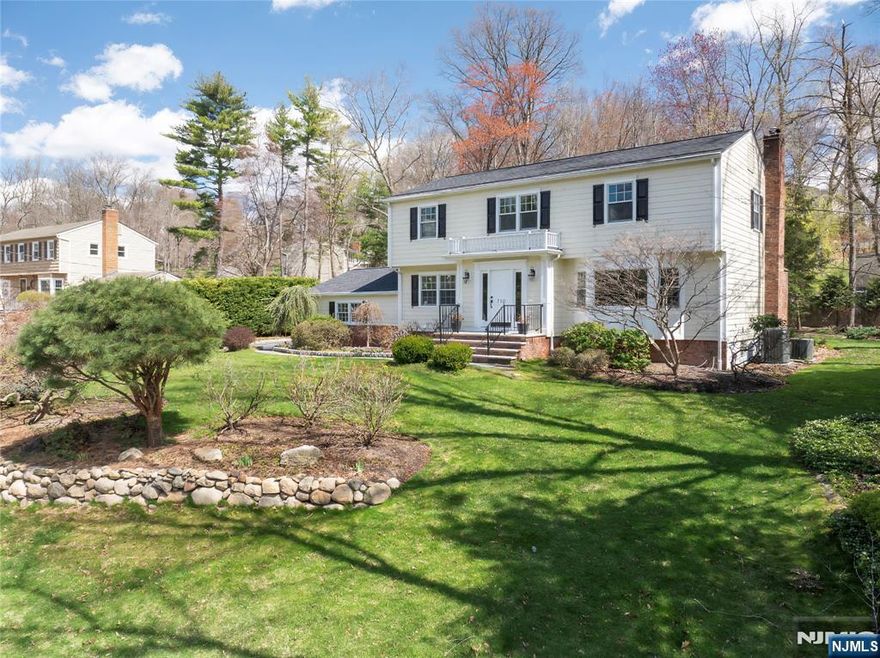 Stately and exquisitely renovated Center Hall Colonial w/remarkable curb appeal & situated on a quiet Residential Street in Northern River Vale. Exceptional curb appeal, expansive lot & extraordinary space. Newly finished glistening hardwood floors throughout. Huge Living Room/French Doors & Dining Room. New Ken Bauer Kitchen cabinetry & quartz counters opens to a Breakfast Rm overlooking the spectacular rear yard. Open flow to the family room leading to the Cathedral Ceiling 3 Season Rm. Stunning new bathroom & 2 Car Garage. Romantic Primary Suite w/2 Walk in Closets & Primary Bath. 3 additional Bedrooms & Full Renovated New Bath . Newly renovated Basement w/access to the garage, large recreation room, home office, PLUS brand new coretech lvp flooring & new full bathroom/laundry room. Enjoy new recessed lighting & fixtures, french doors, iron balusters, a Built in Generator, CAC, PLUS East/West light & bright exposure. Beauty, property, sophistication & location await you