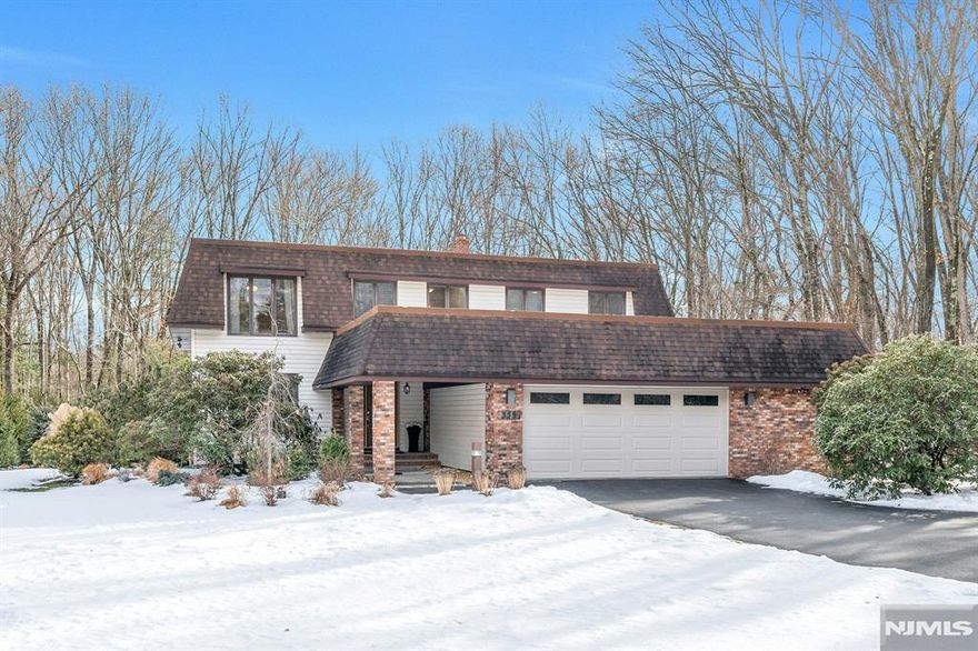 Set on approximately one acre of private, park-like property, this beautifully maintained and updated 4-bedroom, 2.5-bath professionally landscaped home enjoys a desirable cul-de-sac location in prestigious Franklin Lakes.The home offers an updated kitchen with quartzite countertops and stainless-steel appliances, a breakfast area, and a dining room ideal for entertaining.Multiple living spaces provide comfort and flexibility, from an inviting living room to a three-season sunroom overlooking the private backyard, complemented by a stone patio with fire pit.A first-floor laundry room, powder room, and large garage with ample storage add everyday convenience.The second level offers four generously sized bedrooms and two full bathrooms, including a primary bedroom with en-suite bath and steam shower.Cleaning service, lawn care and snow removal are included.Located in the highly regarded Franklin Lakes F.L.O.W. school district and convenient to major roadways, shopping, dining, and recreation.