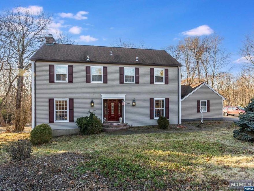 Welcome to this stunning 4-bedroom, 2.5-bathroom colonial gem! The main level boasts a harmonious blend of spaces, featuring a family room, a spacious living room, and a stylish eat-in kitchen adorned with state-of-the-art stainless steel appliances. Step outside onto the inviting deck, perfect for al fresco dining and entertaining. Upstairs, discover four generously sized bedrooms and two full bathrooms, providing ample comfort and convenience. The finished basement, recently renovated to perfection, houses a brand-new washer and dryer for added practicality. With a brand new septic system completing the package, this home is a true embodiment of modern comfort and timeless charm.