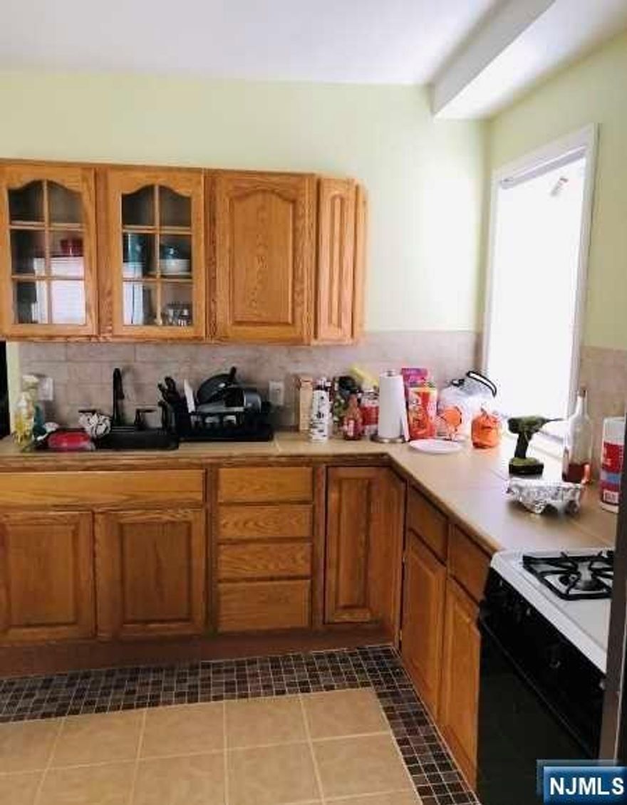 PERFECT FOR INVESTOR OR OWNER OCCUPANT. LIVE IN ONE AND COLLECT RENT IN THE OTHERS. Remodel in 2018. MOVE-IN READY. Easy access to school and NYC. THIS IS A RARE OPPORTUNITY AND WILL NOT LAST!