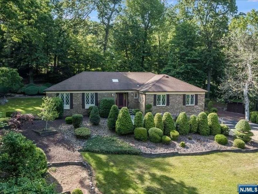 This comfortable four Bedroom Ranch in prestigious Holmehill awaits its new owner! Prime location with great supporting values in a quiet neighborhood with many substantial homes. Larger than it appears from the street, the home is laid out for easy living and entertaining. Highlights include large Living Room, formal Dining Room, cozy Family Room with fireplace, Powder Room, and eat-in Kitchen with a sunny Breakfast nook. Geometric-shaped Sun Room with abundant windows and sliders welcomes the tranquil surroundings inside and takes full advantage of the lovely outdoor setting with manicured shrubbery and tall shade trees. A spacious Primary Suite with Dressing Room, en-suite Bath and walk-in closet plus two additional Bedrooms and full Bath on the first level. Private entrance Guest Suite with Bedroom, Sitting Room and full Bath. There is also a large Workshop, Office, Rec Room and another full Bath on the lower level with access to the 2-car Garage. NEW CENTRAL AIR 2022.