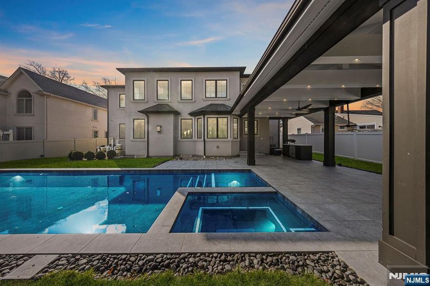 Beautiful house & property on a quiet street in the highly desirable low tax town of Paramus. Newly constructed in 2019 by Porada Development, a very reputable builder. World class Interior design by Ariella Horrowitz Design Group. The estate has been improved with the addition of an inground gunite saltwater pool, and a giant covered outdoor patio by HGTVâ€™s John Colinary. Thereâ€™s also an outdoor kitchenette & gas line for BBQ. See virtual tour for comprehensive walkthrough video, interactive whole-house 3d model, floor plans and more.