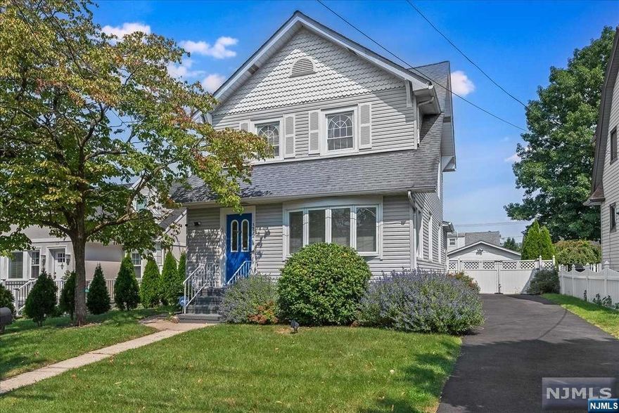 Welcome to this stunning colonial home in Hasbrouck Heights, located in a sought-after neighborhood known for top-rated schools and city amenities. The warm entrance leads to a cozy living room with a wood-burning fireplace and charming bay window. The layout flows into a dining room and modern kitchen, ideal for everyday living and entertaining. A spacious family room or den with a half bath offers flexibility and can serve as a guest room. Upstairs, find three generously sized bedrooms and a full bath, with access through a central hallway. The expansive attic provides ample storage or potential for additional living space. The finished lower level features an extra room for use as a bedroom, office, or recreation room, with its own toilet and shower. A garage adds extra storage and convenience.