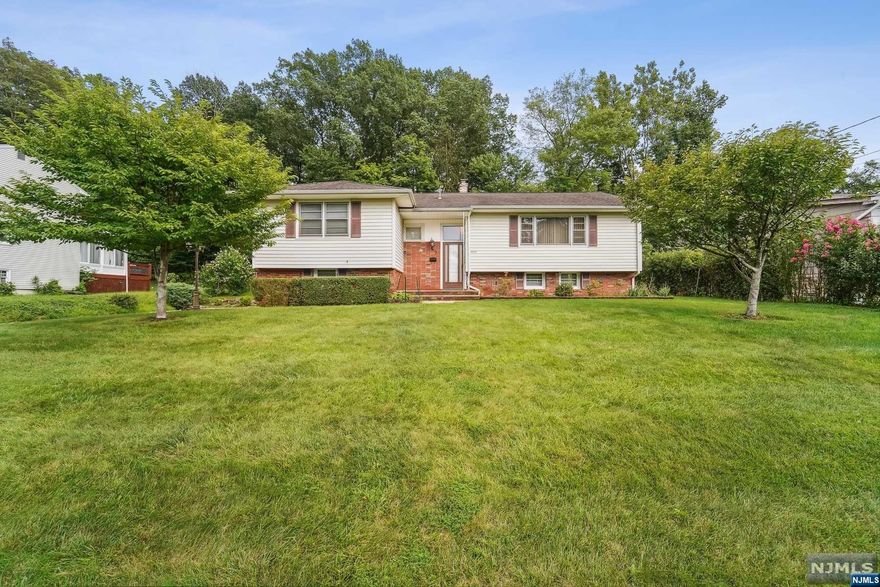 Discover refined living in this well-maintained 3-bedroom, 2.5-bath Bi-level residence situated in one of West Caldwell's desirable neighborhoods. The upgraded kitchen features a tasteful tile backsplash with granite tops, adding both style and practicality. You can easily access the deck from the kitchen, enhancing the connection between indoor and outdoor spaces. The bedrooms are spacious and comfortable, providing a relaxing retreat. The family room is designed for entertainment and includes a bar and a pool table for your enjoyment. The attached oversize 2-car garage offers convenience and extra storage.Experience the comfort of central air conditioning as you explore the recently painted interior, creating a fresh and inviting atmosphere. The property's large lot complements the home's appeal, inviting various outdoor possibilities.Take the opportunity to view this remarkable property in person. Explore its features, ideal for those who appreciate quality living.