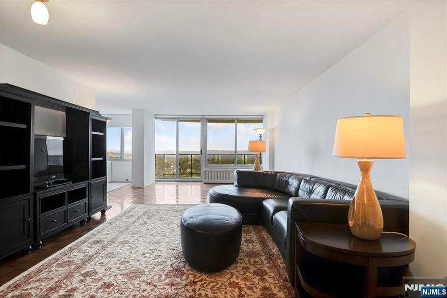 Where luxury meets convenience, the expansive foyer opens to a sun-filled living room with oversized windows and sliding doors leading to a private balcony with pretty views of Verona. A newly renovated kitchen awaits the home chef, while the dining room framed with beautiful windows offers the perfect setting for entertaining. The spacious bedroom easily fits a king bed and full furnishings, while updated bathrooms are ready for your personal touch. Enjoy resort-style amenities including an inground pool, tennis courts, gym, storage, valet parking, and more. This is the move you've been waiting for make it your own today!