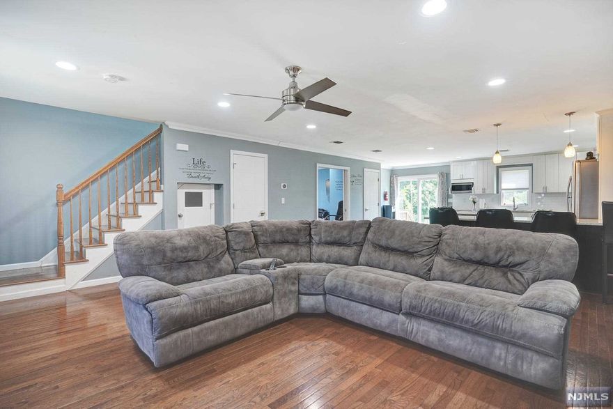 A distinctive 2F in the heart of Lodi, one of the most outstanding suburbs of NYC! Completely redesigned & renovated in 2017, this expansive side by side MF investment property is ready for its next owner. Each of the units is a duplex residence with H/W floors, SS appliances, ample closet space, & tremendous light. Unit #1 provides 4BR/2.5BA & an open concept floor plan. A dream kitchen w/ granite counters, movable island, & breakfast bar. The bonus playroom can be a 5th BR or office space. The primary BR has an expanse large enough for a king-sized bed, plenty of furniture, & a sitting area. From there is a modern BA featuring dual vanities, a stand-up shower, soaking bathtub, & skylight. Unit #2 offers 3BR/1.5BA on the ground level, flowing to the kitchen & living spaces on the upper level. Laundry in each unit, parking for 3+ cars in the driveway, & a shared yard. With one of the best locations anywhere, Lodi is near everything great this side of the Hudson River has to offer!