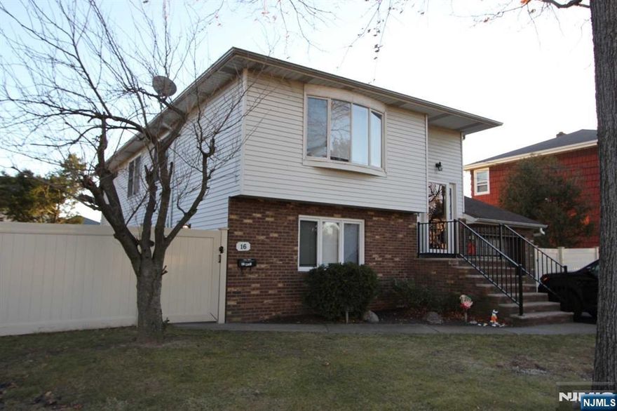 Don't miss this 2-bedroom, 1-bathroom ground-floor apartment in an owner-occupied two-family home in Elmwood Park. The unit features a living room, an eat-in kitchen with granite countertops, and exclusive access to a side yard with a patio and vinyl privacy fence. Enjoy modern conveniences like central air conditioning, hot water baseboard heat, a dishwasher, and in-unit washer/dryer hookups. Conveniently located on a quiet residential street, this home offers easy access to major highways and public transportation. Landlord provides water; tenant is responsible for all other utilities. Clean credit, proof of income, proof of identity, and an interview are required.