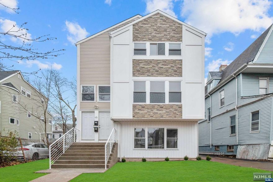 COMPLETED NEW CONSTRUCTION 2 FAMILY: 3/3 Bedrooms with a large open plan concept living & dining room, kitchen & 3 full baths w/ 2 garages and off street parking. Each unit features a master bedroom with a full bathroom that includes a walk-in closet, new appliances & wooden floors. The ground floor level features a recreational room, family room with a bathroom and laundry room. Potential Income $3500/2500 = $6000. 5 year tax abatement & 10 Year Home Warranty. Located in of most sought after areas in East Orange and minutes from Branch Brook Park & East Orange General Hospital. Close to transport links to New York I-280, Garden State Pkwy, neighborhood shops, schools & places of worship. Ideal for an owner occupier that would like their tenant to pay their mortgage or an investor. Please submit your best offer at your first opportunity to avoid any disappointment. The seller would be willing to provide sellers concession for strong offers over the list price.