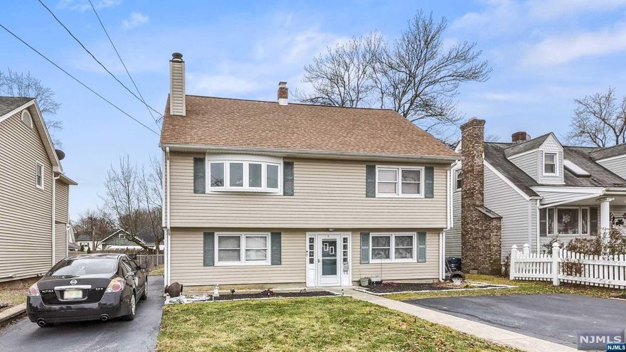 Don't miss your opportunity to own this one-of-a-kind home with a ground level in-law suite! Located just a short stroll from parks, playgrounds, shopping, dining, and NYC transportation, this custom residence boasts: an open main level living area with access to large deck overlooking flat yard, spacious rooms throughout, an updated ground floor suite incl living area/den/bath/kitchenette/and access to yard, easy access to routes 23/287 and so much more. Schedule your tour today!