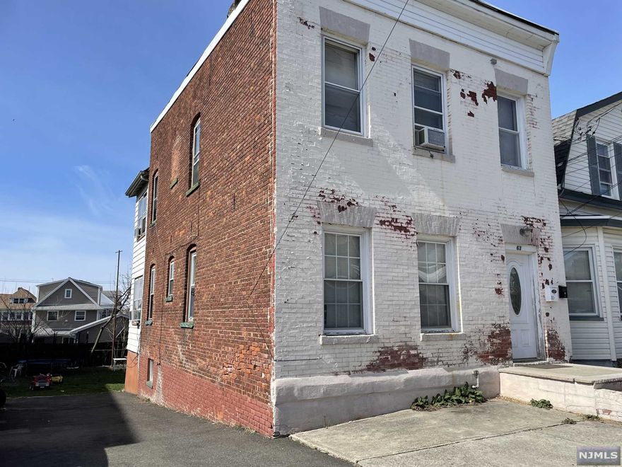 This is a nice opportunity to own a large piece of property in garfield. This has a lot of potential and the location is great. Great for an investment or to build.This property has a huge yard and has a large driveway All showings will be between 10am-3pm Tue and Wed. Come straight to the property after scheduling showing time.