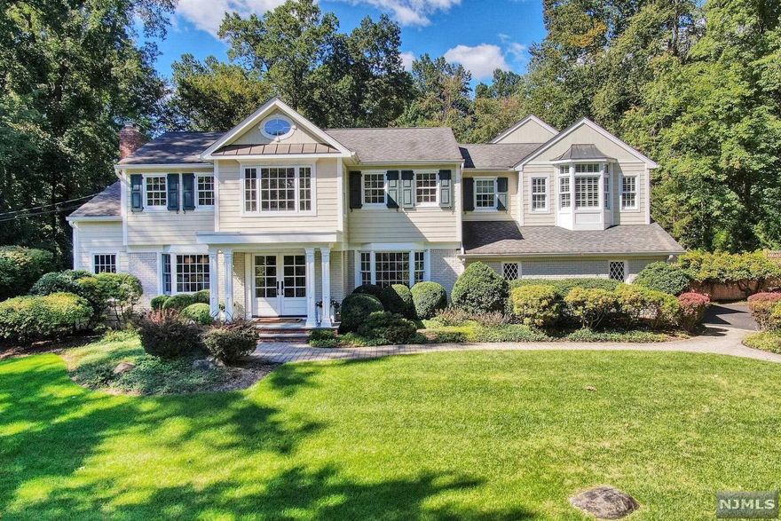 ***MOVE-IN READY*** This stunning Center Hall Colonial boasts 5 BDRS, 3 full & 1 half BTHS. Filled w/natural light & designer choices throughout, this is one you don't want to miss! The entry includes 2 coat closets & opens up to the sizable OFFICE/PLAY RM & FDR w/French doors. The GREAT RM includes a gas FPL, beautiful built-ins w/picture lights & overlooks the pristine yard. MEIK w/breakfast nook, center island w/seating for 4 & SS appliances; Wolf oven, Sub-Zero fridge & Miele dishwasher. A MUD RM/LNDRY RM combo, w/barn door, & PR, round out the 1st floor. Upstairs you will find a spacious primary BDR w/2 walk-in closets, sitting area & attached primary BTH w/steam shower & soaking tub. Another en-suite BDRM w/ FBTH, 3 add'l BDR & FBTH complete the 2nd fl. The finished BSMNT has space for storage & entertaining, & the expansive, private, fully-fenced backyard includes a covered porch, blue stone patio, Gunite salt water pool & pool house w/HBTH. No detail was overlooked!