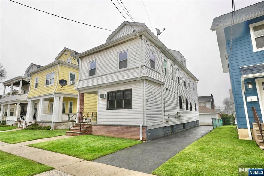 Well-maintained two-family home located on a residential street in Bloomfield. The first and second floor units each offer a spacious living room, eat-in kitchen, full bathroom, and three bedrooms, providing flexible living and income potential. The top floor features two additional rooms and a full bath ideal for extended living space, home office, or guest use. The property also includes a finished basement, detached garage, and private driveway for convenient off-street parking. Steam heat throughout. Conveniently located near local shops, dining, parks, and transportation. A great opportunity for owner-occupants or investors alike.