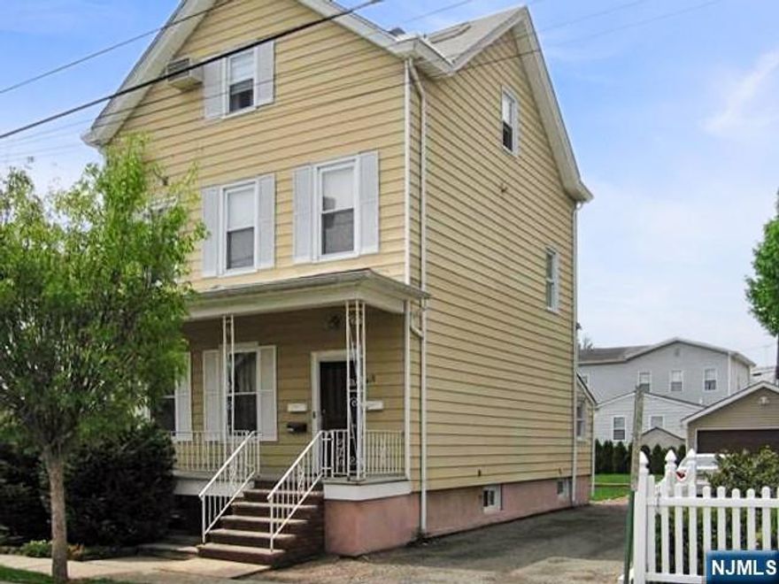 UPDATED TWO FAMILY HOME INCLUDES A TOTAL OF 5/6 BEDROOMS AND 3.5 BATHS ON FOUR FLOORS OF LIVING SPACE. MAIN FLOOR APARTMENT FEATURES LIVING ROOM, UPDATED KITCHEN, TWO BEDROOMS AND BATH. LOWER LEVEL INCLUDES FAMILY ROOM, BEDROOM/OFFFICE, FULL BATH, LAUDRY, PLENTY OF STORAGE SPACE AND CENTRAL AIR. THE UPSTAIRS TWO FLOOR APARTMENT INCLUDES LARGE LIVING/DINING ROOM COMBO, LARGER NEW KITCHEN WITH GRANITE COUNTER TOPS AND LAUNDRY, OFFICE, 3 BEDROOMS AND 1.5 BATHS. WASHER/DRYER AND REFRIGERATOR IN UNIT. PLENTY OF STORAGE SPACE. 1.5 CAR GARAGE PLUS SPACE FOR 4 ADDITIONAL CARS. NICE YARD, SEPARATE UTILITIES, CLOSE TO NYC TRANSPORTATION.