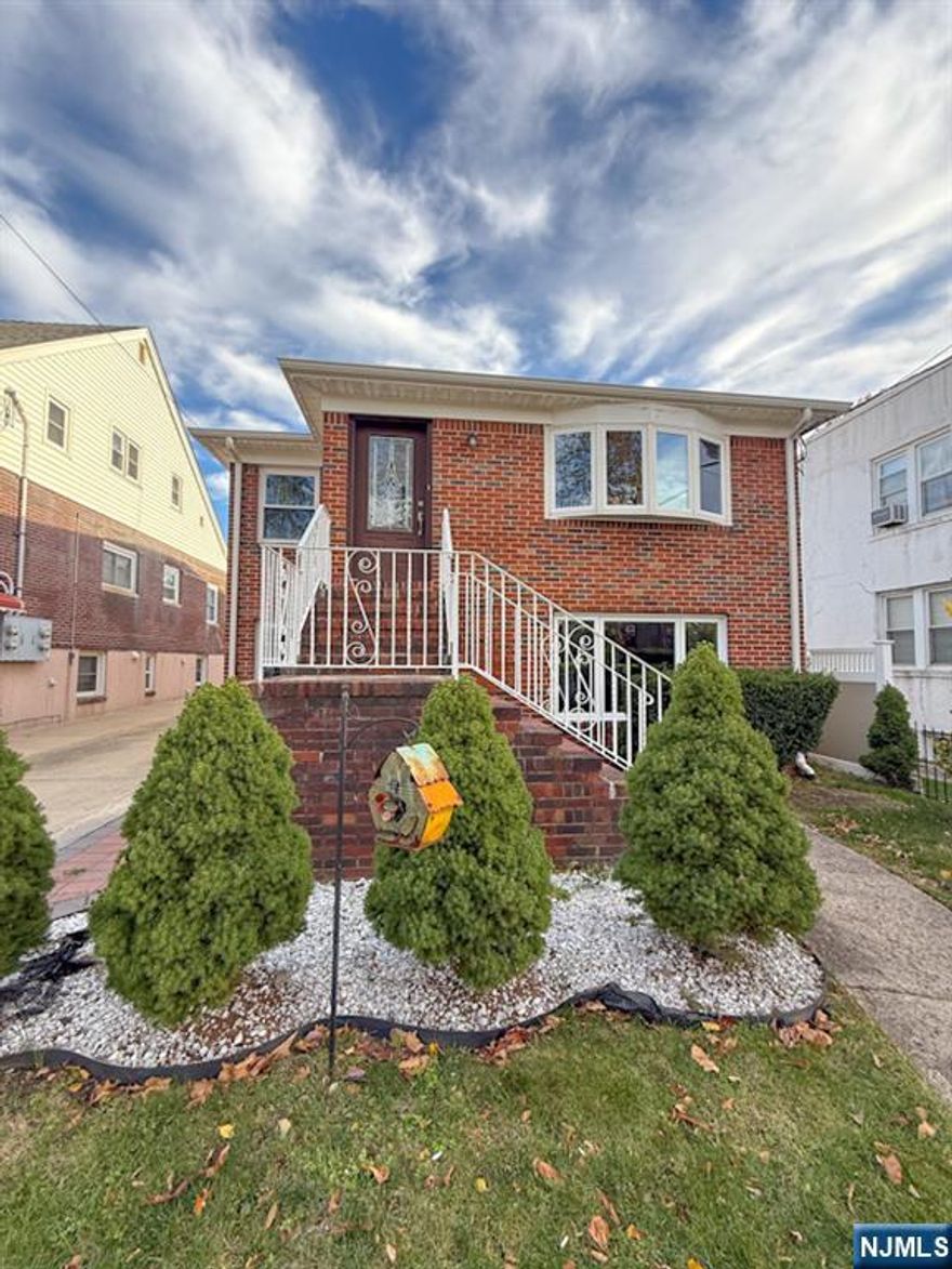 Welcome to this beautifully maintained and freshly painted home nestled in the heart of Cliffside Park! This inviting residence offers a perfect blend of comfort and convenience, featuring three spacious bedrooms and a washer and dryer in-unit. ALL UTILITIES INCLUDED. Step inside to find a bright layout that leads to a recently added heated sunroomâ€”the perfect year-round retreat. This flows directly into a private, paved backyard oasis complete with a built-in gazebo, making it ideal for hosting gatherings, barbecues, or simply relaxing outdoors in style. Conveniently located near top-rated schools, shopping, and major transportation, this home combines suburban tranquility with easy access to city amenities. With NYC transit nearby, this is a commuterâ€™s dream. Don't miss this rare opportunity to own a move-in ready home in one of Bergen County's most desirable communities!