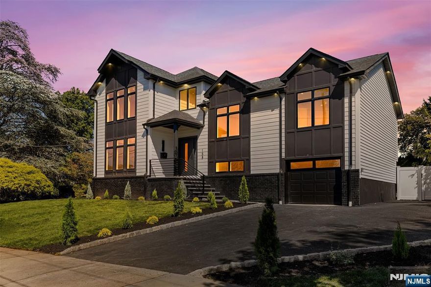 Welcome to this contemporary split in the heart of desirable Oradell NJ! Double story foyer engineered hardwood floors throughout, a pantry with its own dishwasher and sink, multi zoned central air & forced heat, brand new sprinkler system around entire property, in-ground pool, 240 volt outlet to charge electric car in garage and much more! The first level features your double story foyer, formal dining room, walk in pantry, kitchen with a 12ft island, stainless steel LG appliances, pot filler, and more, living room with slider to the back yard. The second level features a junior suite with ensuite bathroom, 2 bedrooms, and another modern bathroom. The third level has a massive primary suite, walk in closet, to a beautiful primary bathroom with soaker tub, rain shower and more. The third level also features the 5th bedroom, laundry closet, and another linen closet. Ground level has a 1/2 bath, door to backyard, entry to the garage, family room/play area. The basement is wide open space that has a storage closet, and utility room. The backyard is an oasis with an in-ground pool, paver patio, grass area, massive pool shed with electric! Walking distance to all the schools too! Come check out this beautiful newly built home on original foundation and what it has to offer in the heart of Oradell!