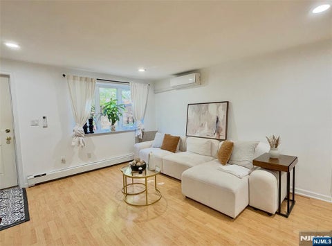 Photo of 12 Burdett Ct #5, Edgewater, NJ 07020 (MLS # 26038136)