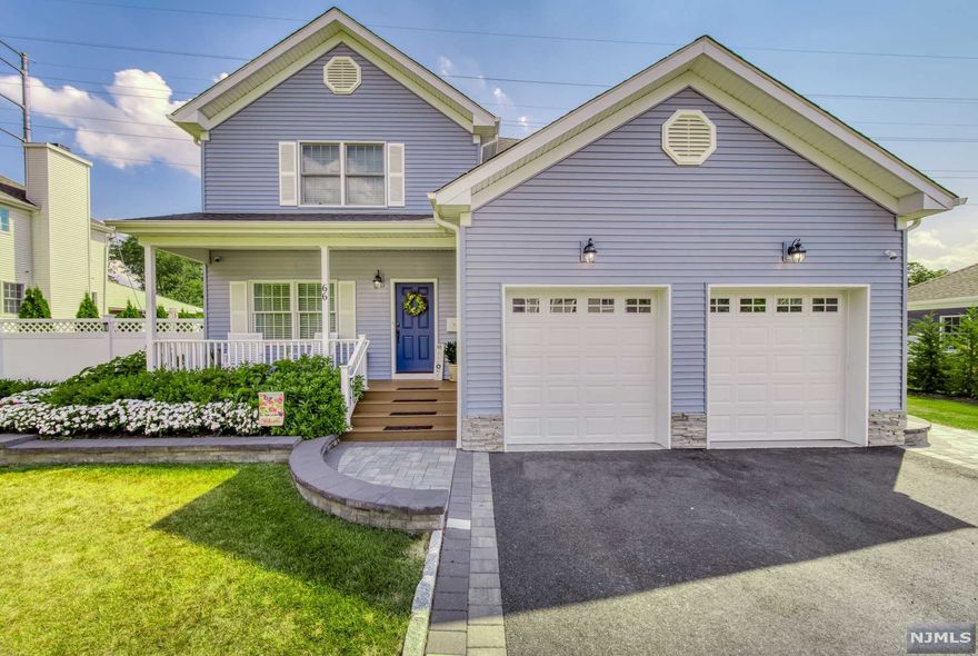 Welcome to this stunning 5 bedroom 3 and ? bathroom meticulously maintained home ready for its new owners! Featuring main floor living room and formal dining room, breakfast room, family room with wood burning fireplace and lovely kitchen fully equipped with stainless steel appliances, ? bath, mud room, laundry room and garage access. Second floor features large master bedroom with full tub and shower bathroom, 3 bedrooms and another full bath. Fully renovated basement features exercise room, recreation room, bar, full bath and guest bedroom. This house sits on 0.35 acres of land with impeccable landscaping and underground lawn sprinklers. Yard is breathtaking with large paver patio, fire pit, pond and hot tub great for entertaining and sharing memorable moments. Part of a distinguished neighborhood conveniently located within a short walk/drive from NYC transportation, major highways, shopping, schools, entertainment and parks.