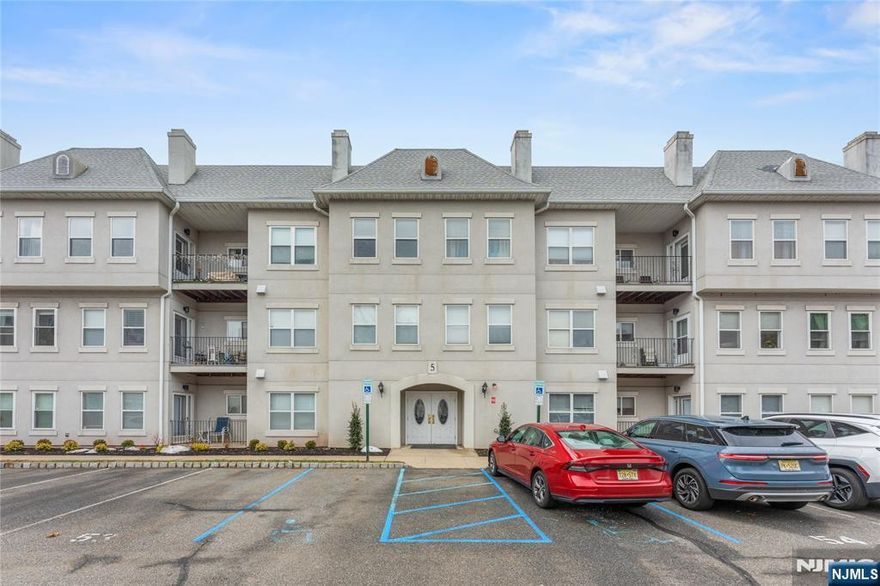 Welcome to Brittany Chase in Wayne! Take the elevator to your second-floor, penthouse-style end-unit townhouse, where bright, open-concept living meets everyday convenience. This 3-bedroom, 2"full-bath home features hardwood floors throughout and an expansive living and dining room combination ideal for both entertaining and daily living. Step out onto your private balcony, overlooking beautifully landscaped grounds and offering a peaceful connection to the outdoors. The renovated kitchen provides ample cabinetry and additional storage, blending style with functionality. The home includes a spacious primary suite with a private full bath, plus two well-sized additional bedrooms, one featuring a brand-new Murphy bed for added flexibility. A separate laundry room off the kitchen adds convenience, and all appliances are included. Recent updates include new central air conditioning and a new water heater, ensuring comfort and peace of mind. Additional highlights include elevator access, assigned parking, extra basement storage, and a large visitor parking lot nearby. Brittany Chase offers resort-style amenities including a pool, fitness center, tennis courts, and a clubhouse with a full kitchen. Comfort, space, and community this home truly has it all.