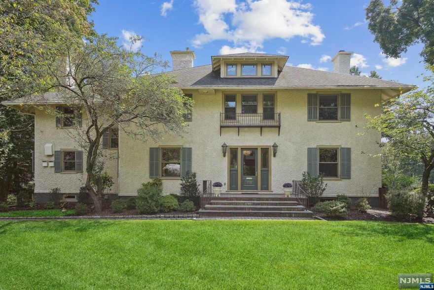 This Spectacular light filled 6 bedroom, 4.2 bath Colonial sits on almost an acre of property with a carriage house and heated gunite pool. The grand staircase sets the stage for the rest of the home which features generous sized rooms, high ceilings, mouldings, & hardwood floors. The first floor features a beautiful Chef's kitchen, adjacent family room, sunroom, living room, dining room and powder room. The primary bedroom provides a sitting area, walk-in closet, laundry room with sink, ensuite full bath with separate tub & shower. This home also features a 3rd floor au-pair suite. The finished basement has Rec room, gym, full-bath, second laundry room, and walkout to the patio. Just steps from Eagle Rock Reservation, Downtown Montclair, endless restaurants, and shops.