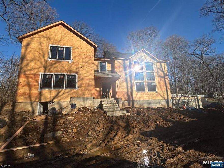 xceptional opportunity to complete a custom luxury residence in one of Berkeley Heights' most prestigious neighborhoods. This substantial new construction offers a rare blank-canvas for builders, investors, or end users seeking to create a high end custom home tailored to today's' luxury standards, surrounded by multi-million-dollar properties. This existing layout supports 5 bedrooms, 3 full bathrooms, 2 half bathrooms and a 2-car garage. This thoughtful layout allows for open-concept living, oversized windows, and is located in a quiet secluded area with convenient access to top-rated schools, parks, major commuter routes, and NYC transportation. Ideal for a luxury renovation, fix and flip, or custom dream home with an estimated after-repair value of $2.3M. Property is being sold "AS IS" . Architectural plans and permits have been approved. A MUST SEE!!!! WON'T LAST LONG!