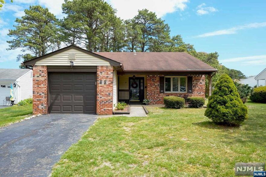 WELCOME TO THE DESIRABLE SEAVIEW VILLAGE ADULT (55+) COMMUNITY. THIS IS ONE FLOOR LIVING AT ITS BEST! THIS CAMBRIDGE MODEL RANCH STYLE HOME HAS WATER VIEWS FROM THE BACK PORCH. LOVELY FRONT PORCH. ENTER INTO THE LIVING ROOM & DINING ROOM. KITCHEN WITH NEWER STAINLESS STEAL STOVE. PRIMARY BEDROOM SUITE WITH PRIMARY BATHROOM & CLOSET. SECOND BEDROOM, HALL BATHROOM & LAUNDRY CLOSET. ONE CAR GARAGE WITH NEW GARAGE DOOR. FRESHLY PAINTED & NICE VINYL WOOD LOOKING FLOORING THROUGH OUT. ENJOY ALL THE FABULOUS AMENITIES LIKE A CLUB HOUSE, OUTDOOR POOL, BOCCE COURTS, CARDS & PLENTY OF OTHER ACTIVITIES. LOW MONTHLY HOA FEES INCLUDE LAWN MAINTENANCE, SNOW REMOVAL, LEAF CLEAN UP & COMMON AREA MAINTENANCE FOR A CARE FREE LIFESTYLE. IF YOUR LOOKING FOR BEACH LIFE SEAVIEW VILLAGE IS THE PLACE FOR YOU! CLOSE TO BEACHES, RESTAURANTS, SHOPPING, THE GARDEN STATE PARKWAY & ATLANTIC CITY.