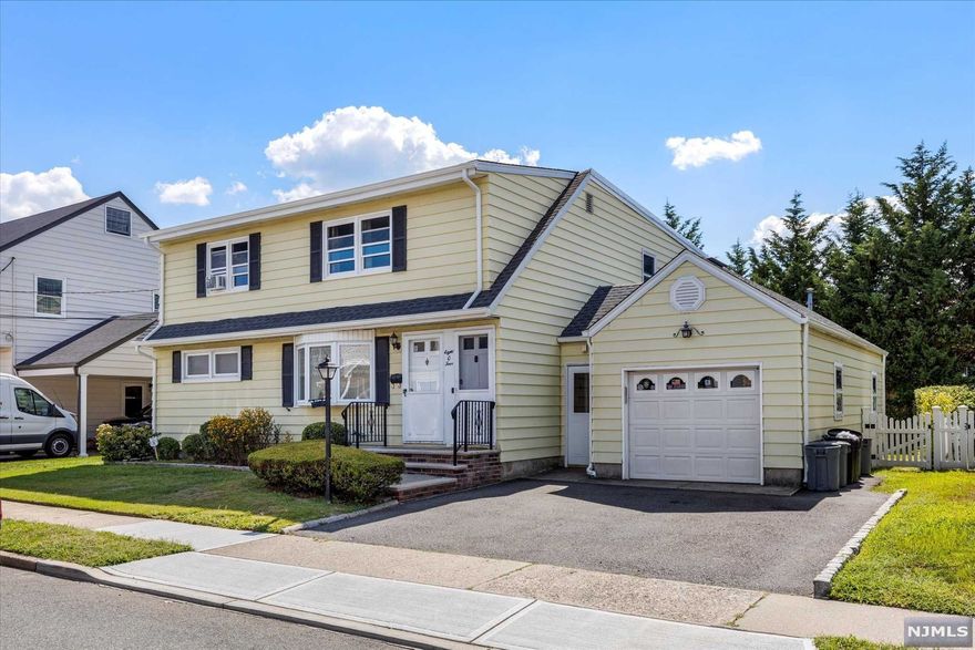 RARE FIND! 2 family in East Rutherford boasting LOW taxes on a quiet street! Unit 1 has 2 bedrooms 1 bath with extremely oversized family room, which could easily accommodate a 3rd bedroom, & separate living room. Newly refinished hardwood floors span the majority of the unit, with the exception of the freshly shampooed carpet in the family room & new vinyl flooring in the kitchen. Unit 2 has 3 bedrooms, 1 bath, lots of storage, large living room, kitchen with space for an island or small table, and spacious dining room. #2 also boasts a large walk in closet with built in storage. Finished basement with new carpet being installed for new owners. Central A/C on first floor and basement. Attached 1 car garage. Steps to NYC buses and close to major highways.