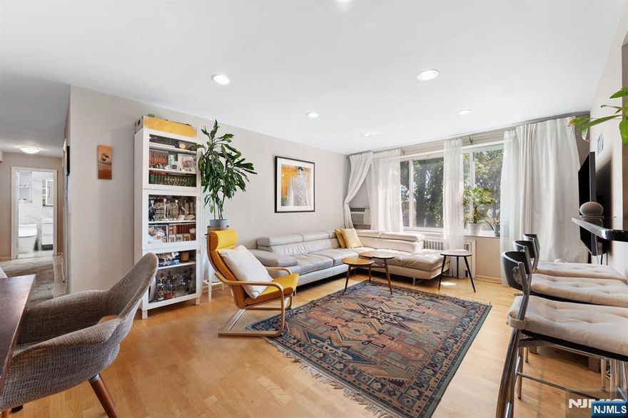 WELCOME HOME! Located on the highly desirable Linwood Avenue in Fort Lee - just a quick 5-minute drive to NYC - this fully renovated, move-in-ready home blends modern comfort with everyday convenience. Just two blocks away, you'll find a Blue Ribbon Award-winning elementary school, making this an ideal location for families. Step inside to a bright, airy open-concept layout filled with natural light from southeast exposures, recessed lighting, and beautifully maintained flooring throughout. The updated kitchen features granite countertops, a 2024 Bosch dishwasher, Bosch oven, and a welcoming breakfast bar. The bathroom was tastefully renovated in 2022 with modern finishes. The spacious primary bedroom easily accommodates a king or queen bed, while the second bedroom offers flexibility for guests, a home office, or nursery. HOA includes heat, hot/cold water, and one parking space. Wall A/C units in each room ensure year-round comfort. With low taxes and low HOA fees, this home is a fantastic opportunityâ€”whether you're investing or looking to settle into Fort Lee's vibrant community. Public transportation is right outside your door, and Fort Lee offers top-rated schools, shops, and dining just minutes away.