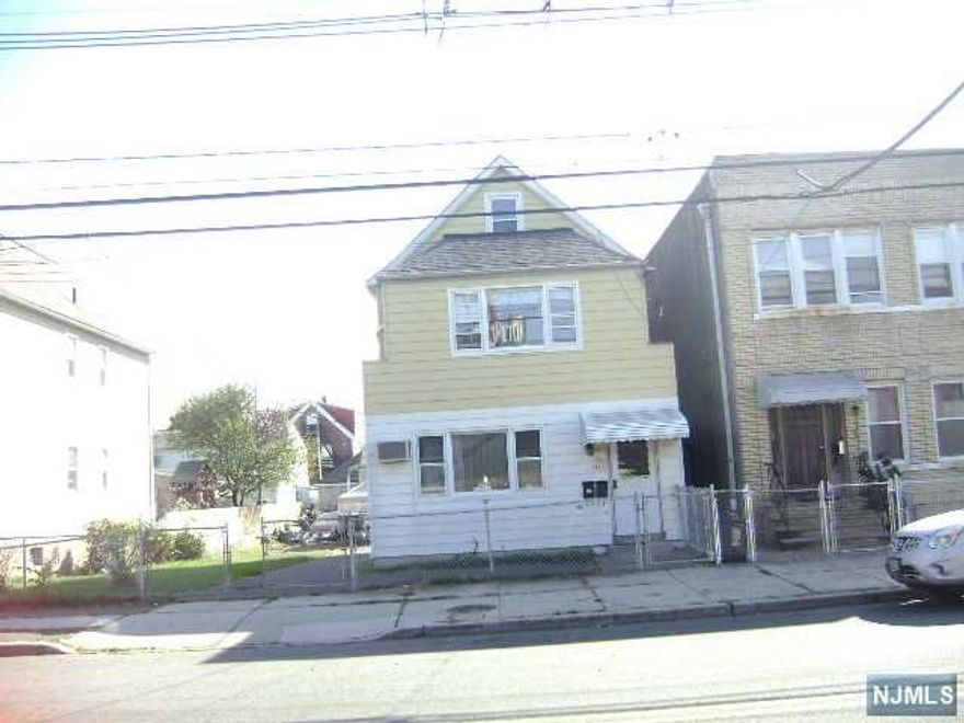 First Floor of a Two-Family featuring, Living Room, Dining Room, Eat in Kitchen & full bath. Washer/Dryer hook ups in basement & Street Parking.