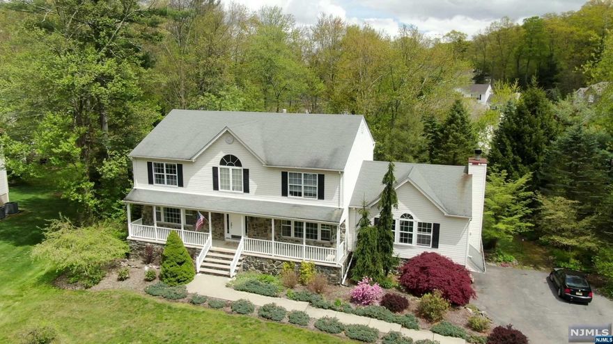 Welcome, there is much to see! Beginning with the Safe & Private Closed-loop street and wide open front yard with functional lawn sprinkler system, 9 Cherbourg Drive is an American Dream Home awaiting its new life to begin. Enjoy your holidays in your formal dining room, or relax beside the fireplace in the gigantic great room. Our fenced-in backyard hosts an impressive and well cared for in-ground pool with a new 3,000 BTU heater and diving board. Choose to be the center of attention with Pool Parties and Barbeques year round or enjoy the solitude of the Architect-designed backyard landscaping surrounded by tall trees and natural Garden State foliage. Walk in and up your widened staircase and hallway to the Master bedroom complete with generous 12 foot Walk-In Closet and Jetted Master bathroom tub. This home was the built 3 feet wider than the other homes in the area for possible wheelchair accessibility. It was the first home constructed in this development and is a true Crown