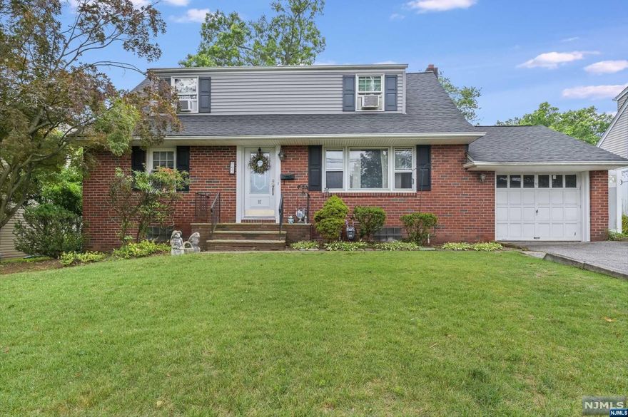 Welcome to this 4-bedroom, 2 full bath Colonial Cape located on a dead-end street in the desirable town of Emerson. Bright living room w/ gas fireplace. Eat-in-kitchen w/ center island, granite counters, stainless steel appliances that open to a large family room w/ slider to a paver patio and large yard. Two bedrooms and a full hall bath complete this floor. 2nd Floor offers two generous size bedrooms and a full hall bath with double sink. The basement is full, finished w/ laundry and tons of storage. C/A/C, 200 AMP Electric. Close to NYC transportation via train and bus. Minutes from center of town, shopping, restaurants, etc. House is priced according to the work needed and is sold in as-is condition.