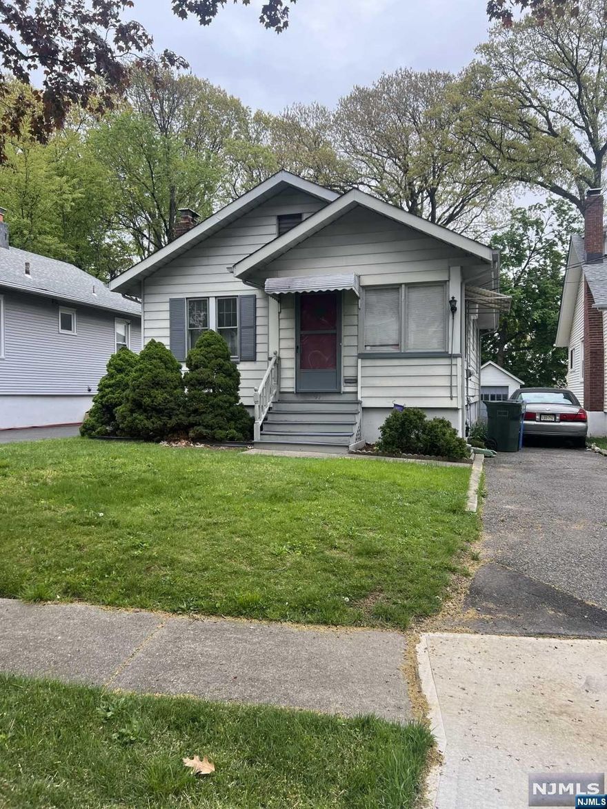 Welcome to your new home in the borough of trees, Rutherford! This charming two bedroom, one full bath home is nestled on a deep 40X140 lot, offering plenty of room for expansion and outdoor living. The home features hardwood flooring and a full semi-finished basement, perfect for additional living space. With a detached garage and long driveway, you'll never have to worry about parking. Located on a dead-end street, you will enjoy privacy while still being minutes away from major highways and transportation to New York City. While the home may need some updating, the potential for this property is truly endless. Don't miss out on this opportunity to make this house your own and create the home of your dreams!