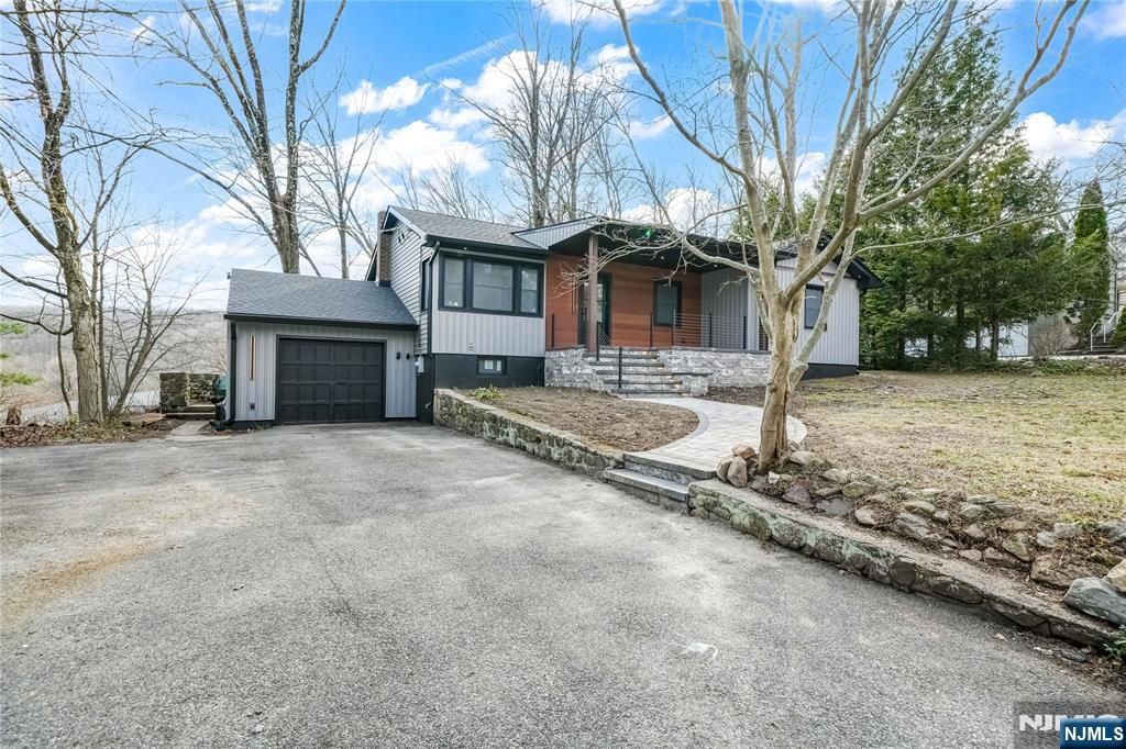 Photo of 132 Upper High Crest Road, West Milford, NJ 07480 (MLS # 26016451)
