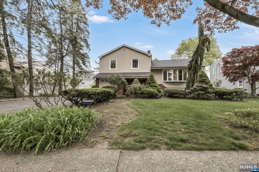 SEIZE THE OPPORTUNITY TO MAKE THIS HOME YOUR OWN IN SOUGHT AFTER PARAMUS. SPACIOUS THREE BEDROOM, ONE AND HALF BATH SPLIT LEVEL HOME LOCATED ON A QUIET TREE LINED STREET. UPON ENTERING, YOU WILL NOTICE THE SPACIOUS ENTRY WAY WITH DOUBLE CLOSETS, OFFICE/GYM, FAMILY ROOM WITH SLIDERS TO PATIO AND HALF BATH. THE FIRST LEVEL OFFERS A LARGE LIVING ROOM WITH HARDWOOD FLOORS, DINING ROOM WITH HARDWOOD AND EAT IN KITCHEN WITH SLIDERS TO A DECK OVERLOOKING A GREAT SIZE BACKYARD. THE SECOND LEVEL FEATURES THREE BEDROOMS, ALL WITH HARDWOOD, AND A FULL BATH. THE BASEMENT IS FULL AND UNFINISHED WAITING TO BE DONE FOR EXTRA LIVING SPACE. THIS HOME OFFERS CENTRAL AIR, ONE CAR ATTACHED GARAGE, ACROSS THE STREET FROM A PARK, CLOSE TO SHOPPING, TRANSPORTATION, BEING SOLD IN STRICKLY "AS IS" CONDITION. TAKE ADVANTAGE OF THE LOW TAXES THAT PARAMUS HAS TO OFFER.