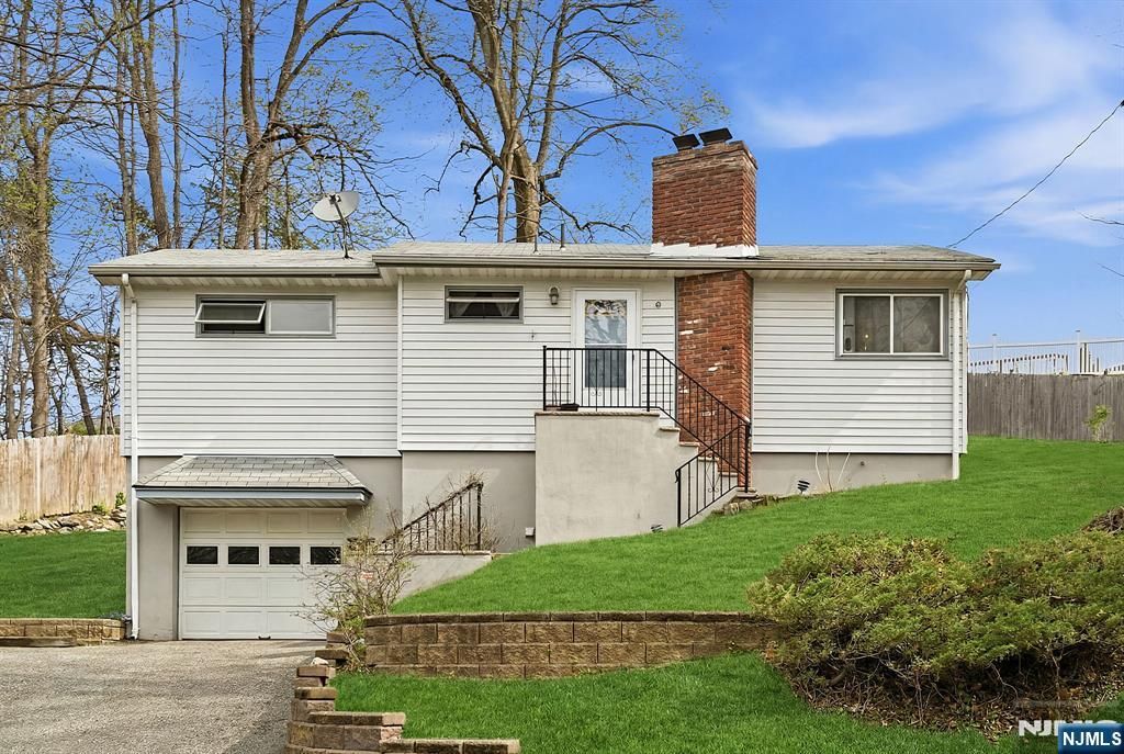 Photo of 10 De Lazier Place, Bloomingdale, NJ 07403 (MLS # 26019651)