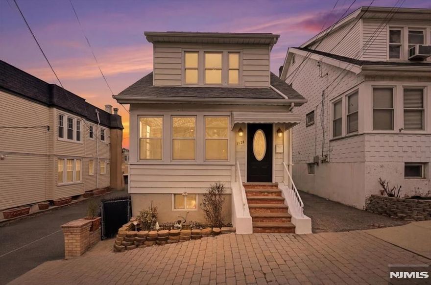 Welcome to this beautifully renovated single-family Colonial in the heart of North Bergen! This move-in-ready home features stunning new flooring throughout and a modern, gourmet kitchen designed for the home chef. The kitchen boasts sleek quartz countertops, an abundance of workspace, and brand-new stainless steel appliances. The main level offers a spacious Living Room/Dining Room combination, perfect for gathering. This home provides great storage with three bedrooms and the convenience of a full bathroom on every floor. Step outside to a nice-sized backyard, an ideal space for family entertainment and summer BBQs. Parking is a breeze with a detached garage featuring a brand-new electric door, plus an additional dedicated parking space. Located in a prime area close to shopping, dining, and transportationâ€”donâ€™t miss the opportunity to make this house your home!