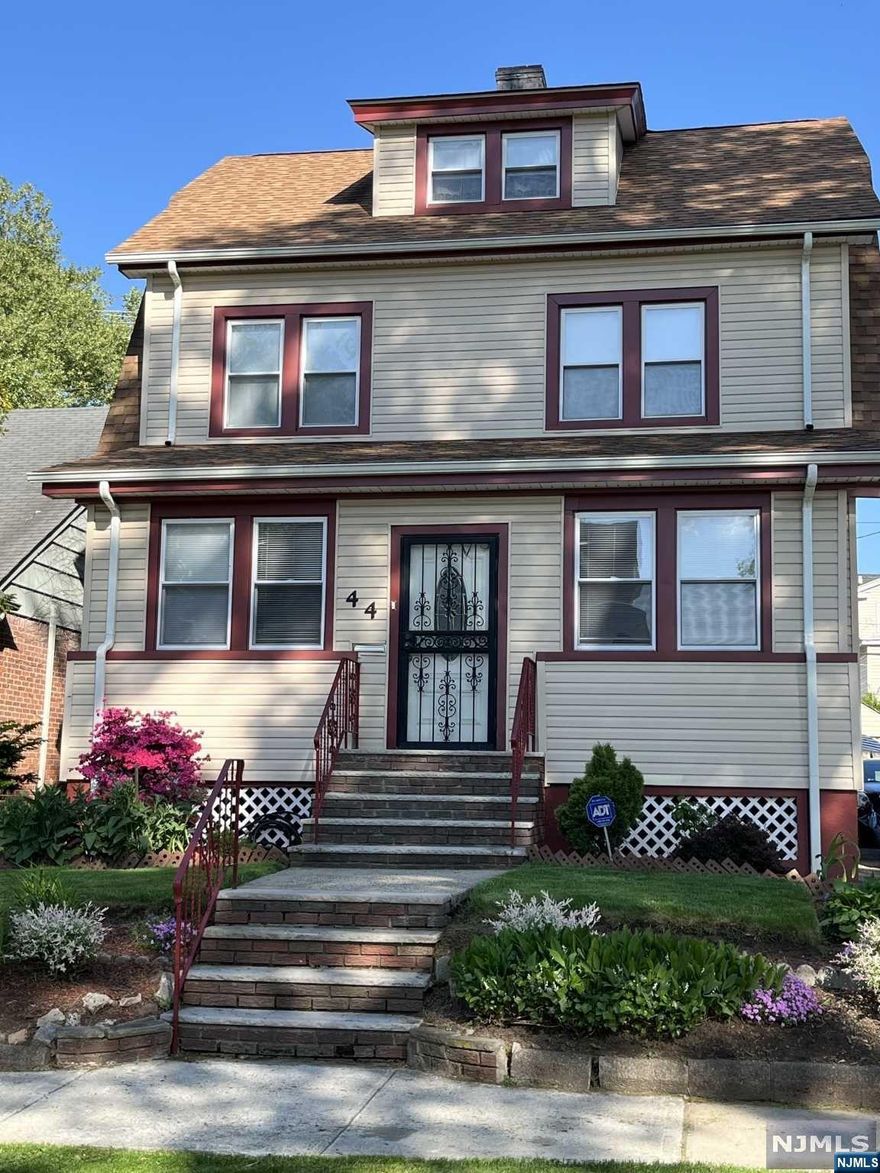 Welcome to this charming colonial home with its timeless appeal! Nestled in a prime location, with four bedrooms, 1.5 baths, and a finished basement. The spacious living room boasts lots of natural sunlight and a picturesque stain glass window, granting easy access to a welcoming enclosed porch that greets you at the front door. The 2nd floor offers 3 generously sized bedrooms with a large bathroom and walk-in closet. The 3rd floor encompasses a large bedroom with a walk-in closet, ideal for an office space or recreation room. It also includes a walk-in attic perfect for storage space. You have the opportunity to customize, make renovations to your desire, live in to enjoy or as an investment! Good location and rea! close to transportation, highways, schools and worship! Don't miss out on this opportunity to make it yours!!