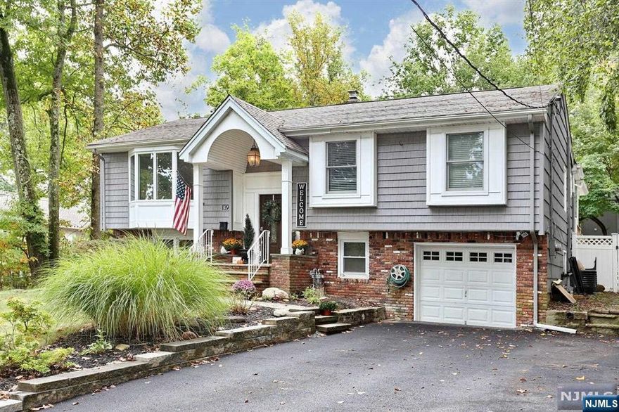 Exquisitely Renovated 5-Bedroom, 2.5-Bath Bi-Level Home?Discover this beautifully renovated 5-bedroom, 2.5-bathroom bi-level home, designed with modern comfort and entertaining in mind. The Architectural Moldings, Coffer ceiling and Lighted Tray ceiling in the living area of this home is truly a a Site to see! The open-concept layout features a gourmet kitchen, perfect for hosting gatherings and dinner parties. Spacious living areas offer plenty of room for both relaxation and entertainment. Enjoy your own private retreat with a large backyard, featuring an above-ground pool and a fabulous deck perfect for summer fun and outdoor entertaining. Conveniently situated in Park Ridge, this home provides easy access to schools, local shopping, and transportation, offering a great balance between suburban tranquility and everyday conveniences.