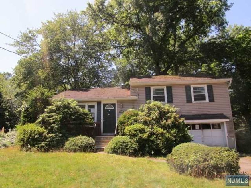 This Split Level style home offers three bedrooms, 1.5 baths, built in garage, over size deck and central air. Very nice opportunity for someone who is willing to see past the current condition and imagine the endless possibilities in having a totally renovated home with their own personal touches. Easy access to the Garden State Parkway, plus local shopping. This is a perfect home for a home renovation that allows you the ability to borrow the funds needed for repairs and upgrades. Flood insurance may be required by your lender. Buyer is responsible for all certificates and CO. "Chase Employees: Please see the Chase Acknowledgement for restrictions. The deadline for buyers to respond to the highest and best request Tuesday 09/06/2022 at 11:59 PM.