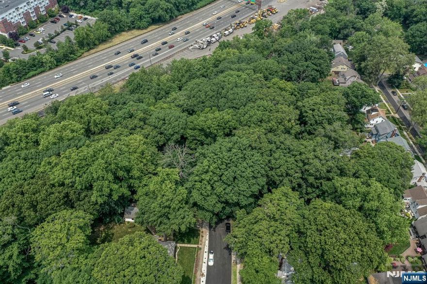 Opportunity is knocking! Nearly 1.5 Acres of Land in Bloomfield is bursting with possibilities! Situated on a quiet dead-end street with plenty of peace, privacy & serene nature views. Close to shopping, dining, parks, and easy access to major highways for a seamless commute. Zoned for Single Family Residential with water and sewer hook-up in the street. Incredible Land Value! This is an excellent opportunity for conractors, investors, and creatives alike! Why settle when you can build the home you've always desired? Come and see for yourself! Claim your slice of Bloomfield today! *Buyer must confirm all zoning with the town.