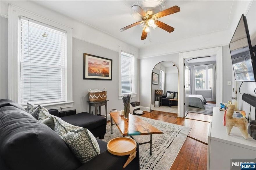 Welcome to this expansive two-family home in the heart of Bergen-Lafayette, one of Jersey Cityâ€™s most historic and fastest-growing neighborhoods. Perfectly situated between two Hudson-Bergen Light Rail stations, multiple bus lines, and major highways, this location offers unmatched convenience for commuters and residents alike. Both units feature generous bedrooms, recent upgrades, gleaming hardwood floors, and modern kitchens with stainless steel appliances. Bright, open layouts provide flexibility for living, investment, or owner-occupancy with rental income potential. Outside, youâ€™ll find parking for 4+ cars, a rare amenity in this part of Jersey City. Enjoy the vibrant community just beyond your doorstep, with newly renovated parks, local cafés, and a growing collection of restaurants adding to the neighborhoodâ€™s appeal. Whether youâ€™re seeking space, convenience, or long-term value in a booming market, this Bergen-Lafayette two-family delivers it all.