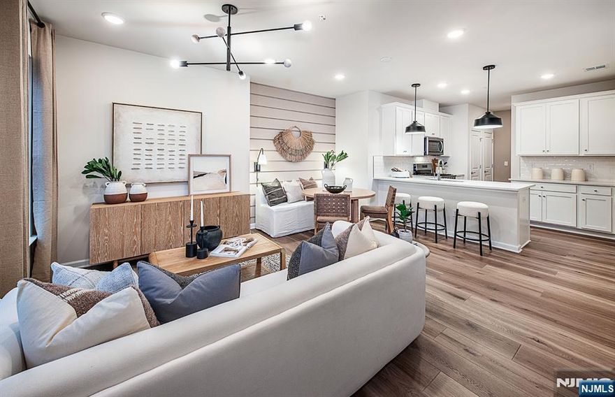 Discover a vibrant blend of comfort, convenience, and connection at Bridgeview - a stunning new construction townhome community in commuter-friendly Kearny, NJ. Perfectly positioned for effortless travel, Bridgeview offers quick access to major highways, the PATH train to NYC, and Newark Liberty Airport - making it an ideal home base for busy professionals and frequent travelers alike. This beautifully designed Bowery townhome features 2 spacious bedrooms, 2 full bathrooms, and is thoughtfully set away from the main road, offering a peaceful retreat with added privacy. Inside, you'll find open-concept living areas, sleek modern finishes, and low-maintenance design - creating a space that's both stylish and functional. Step outside your door and enjoy resort-style amenities, including a sparkling pool, fitness center, elegant club room, co-working lounges, outdoor grilling areas, dog runs, and a shuttle to the PATH station. Plus, you're just a short stroll from everyday essentials and local favorites like Starbucks, LA Fitness, ShopRite, Target, BJs, and a variety of dining and entertainment options. Whether you're seeking elevated living, unbeatable convenience, or the perfect commuter location - the townhomes at Bridgeview check every box.