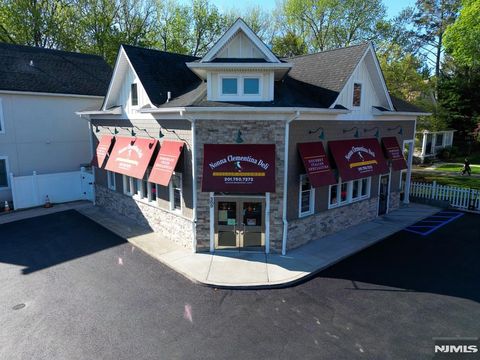 Photo of 309 Closter Dock Road, Closter, NJ 07624 (MLS # 26012309)